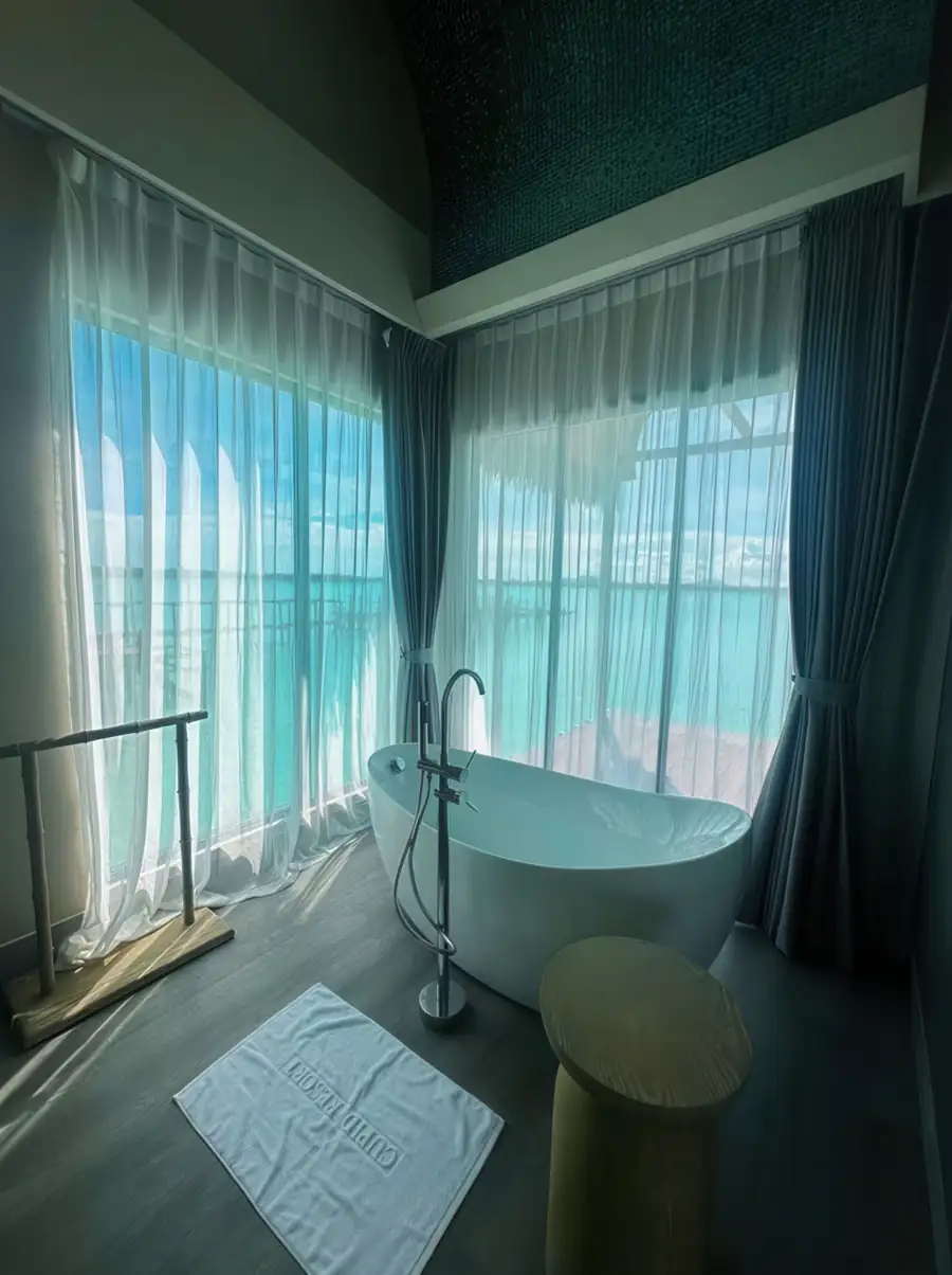 Tub over turquoise water